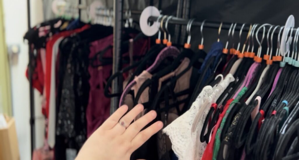 image of hangers with lingerie hanging on them in the studio in Minneapolis. 